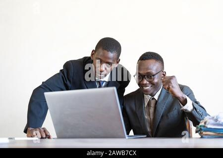 Black working men studying in their office in a private office Stock Photo