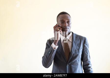 Couple of African Businessman in the office with handshake posing for the camera Stock Photo