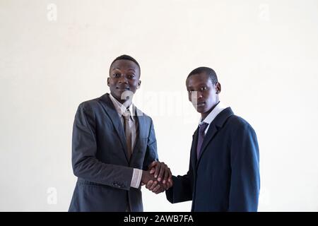African	Business men together looking seriously posing for the camera Stock Photo