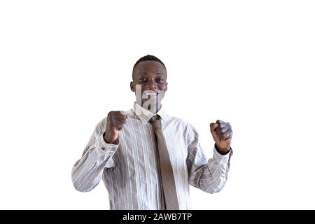 Innovative African University Guy posing for the camera happy and Happiness Symbol Stock Photo