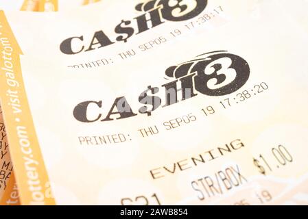 Vidalia, Georgia / USA - September 9, 2019: A close-up studio shot of the Georgia Cash 3 lottery printout ticket. Stock Photo