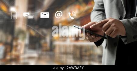 (Customer Support Hotline people CONNECT ) phone application CONTACT US man cellphone Stock Photo
