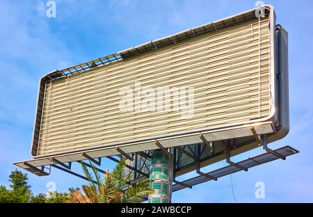 Empty big billboard under construction over the blue sky Stock Photo