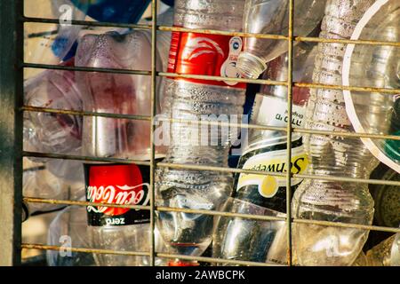 Tel Aviv Israel February 06, 2020 Closeup of a plastic garbage container in the streets of Tel Aviv in the afternoon Stock Photo