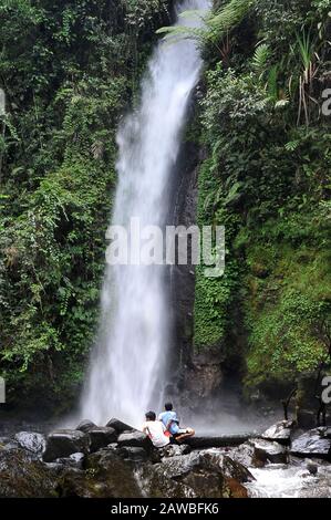 Curug Sawer Waterfalls, a small but exotic waterfall near Situ Gunung Lake in Sukabumi, West Java, Indonesia. Stock Photo