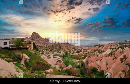 Colorful hot air balloons flying over at fairy chimneys in Nevsehir, Goreme, Cappadocia Turkey. Hot air balloon flight at Cappadocia Turkey Stock Photo