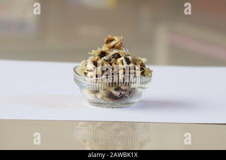 On floor bowl of Moringa oleifera is Drumstick seeds used as herb in South Asia. Also known as Horseradish ben oil Benzolive seeds. Has many health be Stock Photo