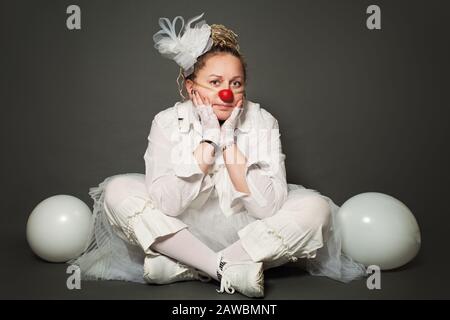 Portrait of actress woman clown. Performance Actress at work, White Clown Character Stock Photo