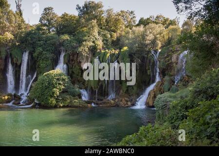 Bosnia and Herzegovina, Kravica Waterfalls - June 2018: Popular with tourists Kravica waterfall is a large tufa cascade on the Trebižat River, in the Stock Photo