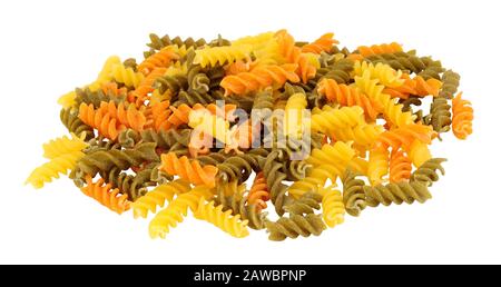 Group of uncooked tricolore fusilli pasta twist shapes isolated on a white background Stock Photo