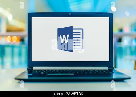 POZNAN, POL - JAN 30, 2020: Laptop computer displaying logo of Microsoft Word, a word processor developed by Microsoft Stock Photo