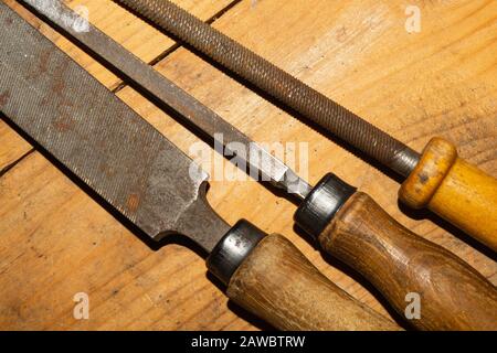 Old rasp. different carpentry files. various graters. instrument for wood processing. hand tools Stock Photo
