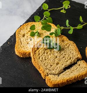 Dry toast and butter. Close-up. Stock Photo