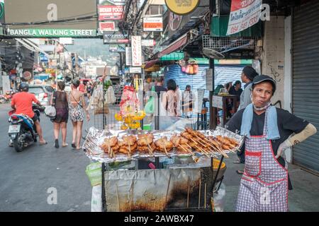 Bangla Road in Patong. This street becomes a bustling walking street at night in Patong, which is one of the busiest parts of Phuket. Stock Photo