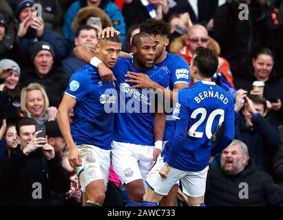 Everton's Richarlison (left) celebrates scoring his side's second goal of the game with team-mates during the Premier League match at Goodison Park, Liverpool. Stock Photo