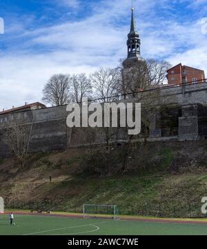 April 21, 2018 Tallinn, Estonia. Football field at the fortress wall of the Old city in Tallinn Stock Photo