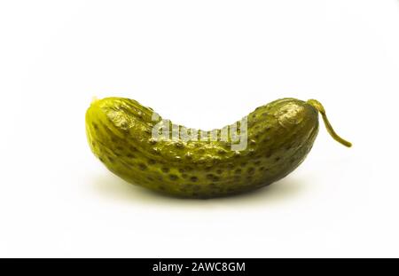 lone pickled cucumber on white Stock Photo