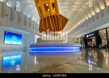 An empty shopping mall in the interior of the O2 Millennium Dome in North Greenwich London Stock Photo