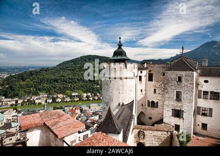Hohensalzburg fortress sits high on a hill overlooking Salzburg Austria. Stock Photo