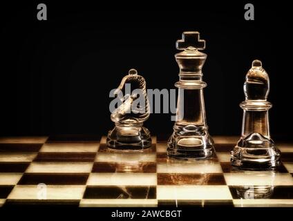 Stylised chess pieces on chess board. Stock Photo