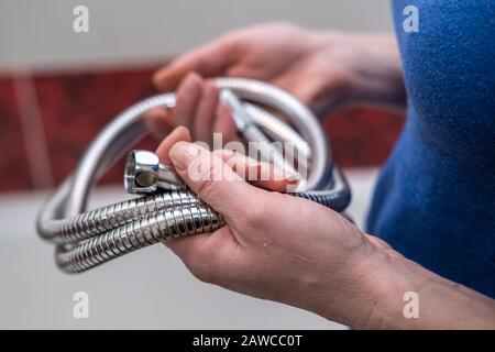 Broken hand shower holder hi-res stock photography and images - Alamy