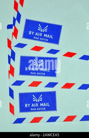 The corners of three air mail envelopes showing the air mail logo of each of them Stock Photo