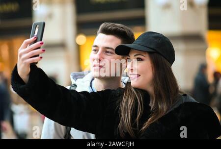 Couple of turists taking a selfie in the city Stock Photo