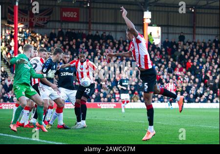 London, UK. 08th Feb, 2020. Brentford's Julian Jeanvier no 23 scoring first goal during the Sky Bet Championship match between Brentford and Middlesbrough at Griffin Park, London, England on 8 February 2020. Photo by Andrew Aleksiejczuk/PRiME Media Images. Credit: PRiME Media Images/Alamy Live News Stock Photo