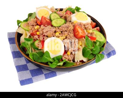 Tuna and pasta salad meal with boiled egg isolated on a white background Stock Photo