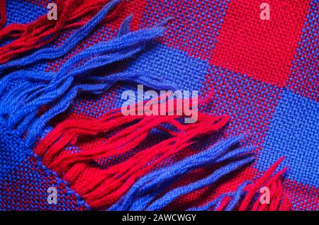 Blue and red checked scarf with fringe as background Stock Photo