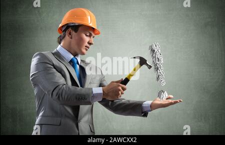 Businessman going to crash exclamation mark Stock Photo