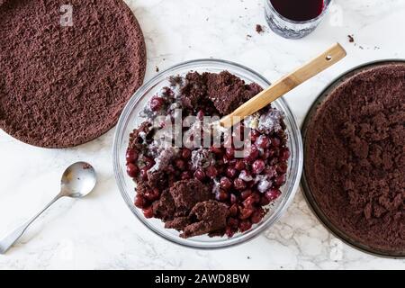Process of making chocolate cherry cake. Step by step recipe of chocolate cherry cake. Series. Baking concept. Top view. Stock Photo