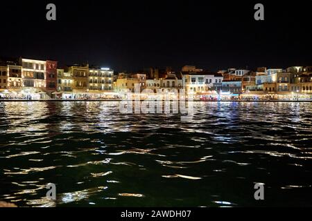 venetian harbour lighthouse in Chania, Crete, Greece at night, long exposure Stock Photo