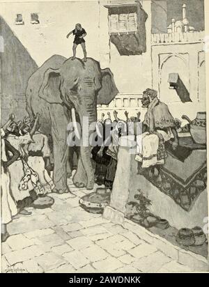 StNicholas [serial] . THE DE VINNE PRESS, NEW YORK. I&gt; II* X. •THE CHILDRENS ELEPHANT, THE GREATEST OF ELEPHANTS, HAS COME BACK! (see pace 195.) ST. NICHOLAS. Vol. XXVII. JANUARY, 1900. No. 3. THE LITTLE BOY AND THE ELEPHANT. Mama! —mama! cried a little boy. But she could not hear him, nor could hesee her; but what he did see, and it frightenedhim very much, was a big crocodile. Thelittle boy hardly had time to be in real dangerbefore he saw a large elephant come from thebushes. Coiling its trunk around the tail ofthe crocodile, the elephant flung him into theair. The little boy — Prince No Stock Photo