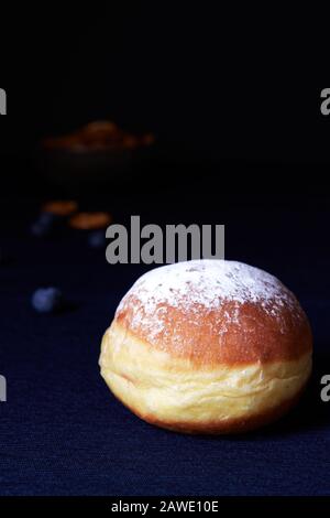 The krapfen are stuffed doughnuts sold in Germany at the end of February as the traditional pastry of the Carnival season. Stock Photo