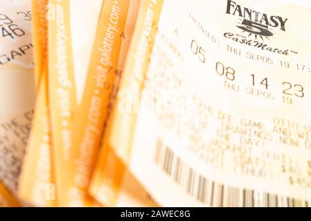 Vidalia, Georgia / USA - September 9, 2019: A close-up studio shot of the Georgia Fantasy 5 yellow lottery printout ticket. Stock Photo