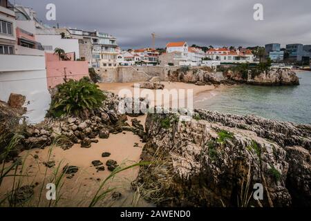 The Praia da Rainha is the smallest beach within the vicinity of Cascais but it is by far the most picturesque. So beautiful was the small cove that i Stock Photo