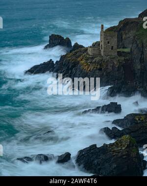 Botallack Mines, Cornwall, 8th February 2020. UK Weather: High winds hit the Cornish coastline bringing Atlantic waves crashing into the rocks at Botallak Mines near St Just, Cornwall on Saturday afternoon ahead of Storm Ciara. Severe weather warnings have been issued with 80 mph winds and heavy rain forecast when the full impact of the storm hits the UK tomorrow. Warnings of widespread travel disruption have been issued. Credit: Celia McMahon/Alamy Live News