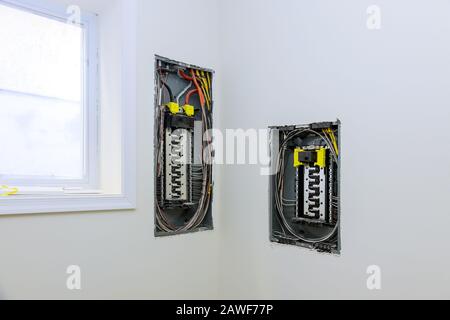 Electrical voltage switchboard box with wires with circuit breakers. Stock Photo