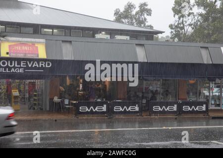 Sydney, Australia. 9th Feb 2020. Wild weather batters Sydney, people in avalon beach take shelter in a cafe, Sydney, Australia Credit: martin berry/Alamy Live News Stock Photo