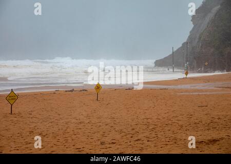 Sydney, Australia. 9th Feb 2020. Wild weather drenches sydney, bilgola beach is closed on a summers day as heavy rains fall over Sydney combine with a king tide, Bilgola Beach, New South Wales Australia -live news image Credit: martin berry/Alamy Live News Stock Photo