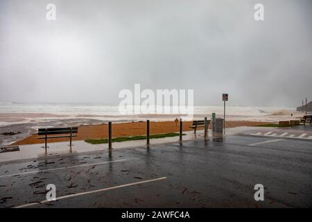 Sydney, Australia. 9th Feb 2020. Wild weather drenches sydney, bilgola beach is closed on a summers day as heavy rains fall over Sydney combine with a king tide, Bilgola Beach, New South Wales Australia -live news image Credit: martin berry/Alamy Live News Stock Photo