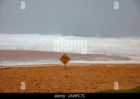 Sydney, Australia. 9th Feb 2020. Wild weather drenches sydney, bilgola beach is closed on a summers day as heavy rains fall over Sydney combine with a king tide, Bilgola Beach, New South Wales Australia -live news image Credit: martin berry/Alamy Live News Stock Photo