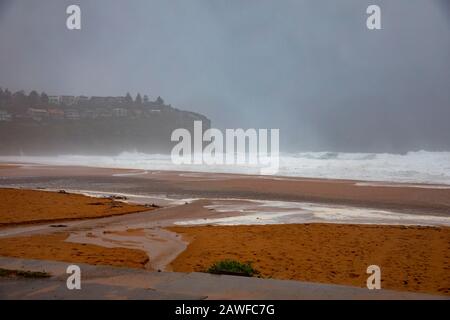 Sydney, Australia. 9th Feb 2020. Wild weather drenches sydney, bilgola beach is closed on a summers day as heavy rains fall over Sydney combine with a king tide, Bilgola Beach, New South Wales Australia -live news image Credit: martin berry/Alamy Live News Stock Photo