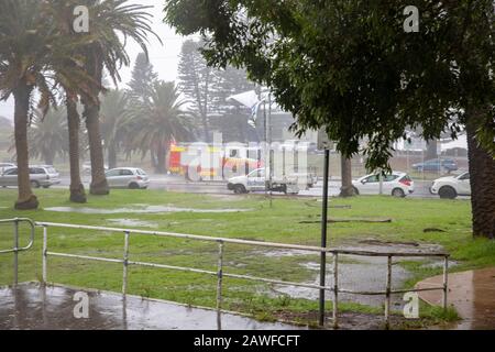 Sydney, Australia. 9th Feb 2020. Flooding in Avalon Beach Sydney on a summers day as afire truck responds to an emergency, Sydney, Australia Credit: martin berry/Alamy Live News Stock Photo