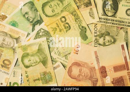 Different money from many countries. various currencies on the table. finance background Stock Photo