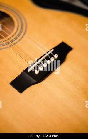 Guitar close up blurry strings Low depth of field Stock Photo