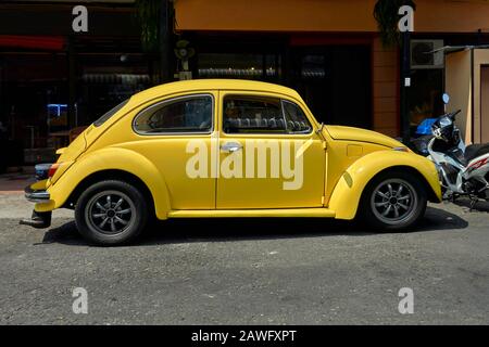 Yellow VW Beetle car Stock Photo