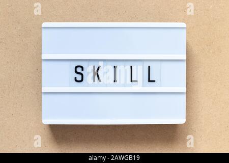 White lightbox with word sill on wood background Stock Photo