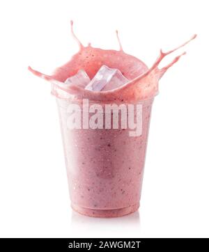 Strawberry milkshake in plastic takeaway cup isolated on white